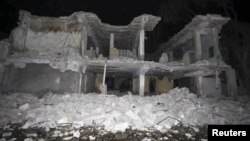 A section of walls collapsed after a car bomb attack in Hamarweyne district in Mogadishu, Somalia, Feb. 26, 2016.