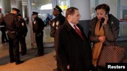 Congressman Jerrold Nadler, left, and Congresswoman Nydia Velazquez, right, stand in the entrance of Terminal 4 at John F. Kennedy International Airport in Queens, New York, Jan. 28, 2017. 