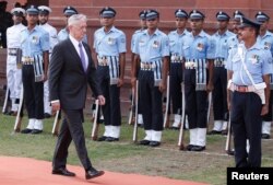 U.S. Defense Secretary Jim Mattis inspects an honor guard in New Delhi, India, Sept. 26, 2017.
