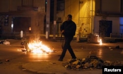 Riot police clash with protesters during demonstrations against rising prices and tax increases, in Tunis, Tunisia, Jan. 10, 2018.