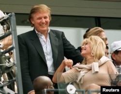 FILE - Developer Donald Trump talks with his former wife Ivana Trump during the men's final at the U.S. Open.