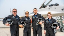 In this Aug. 8, 2021 photo provided by John Kraus, from left, Chris Sembroski, Sian Proctor, Jared Isaacman and Hayley Arceneaux stand for a photo in Bozeman, Mont., during a 