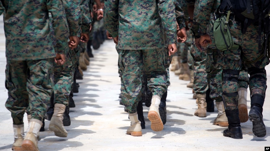 Members of Haiti's new national military force march during training at a former U.N. base in Gressier, Haiti, April 11, 2017. While it's easy to find citizens who strongly support reconstituting a Haitian army, the idea alarms those who vividly remember military coups and oppression.