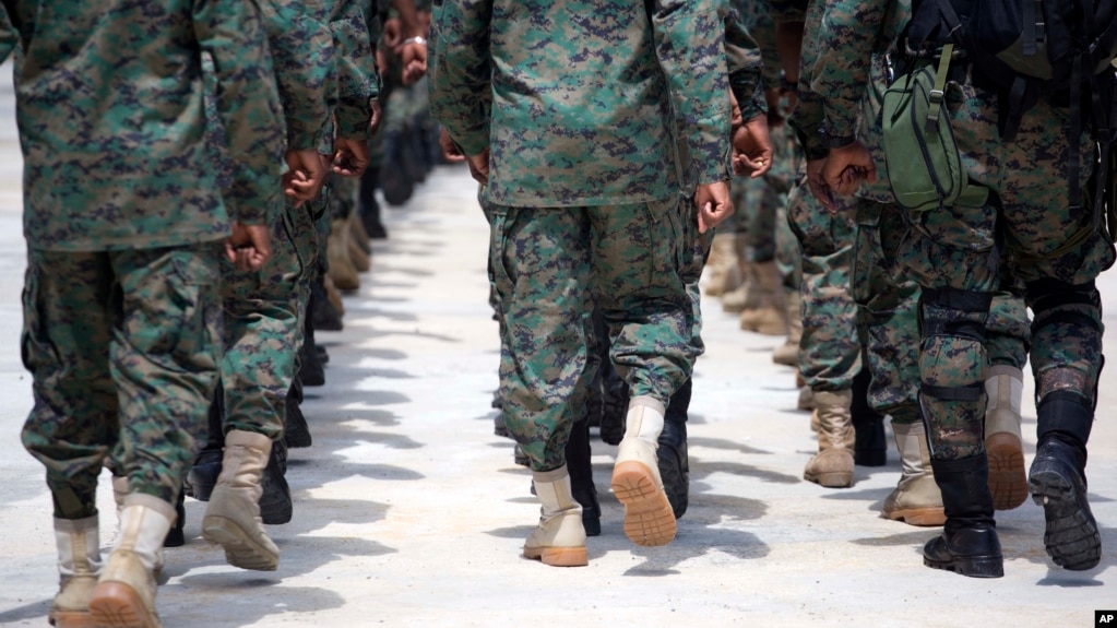 Members of Haiti's new national military force march during training at a former U.N. base in Gressier, Haiti, April 11, 2017. While it's easy to find citizens who strongly support reconstituting a Haitian army, the idea alarms those who vividly remember military coups and oppression. 