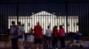 Tourists gather outside the White House as former U.S. President Donald Trump was addressing the Republican National Convention being held in Milwaukee, in Washington,