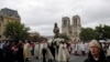 Emotional Paris Ceremony Near Notre Dame for Assumption Day