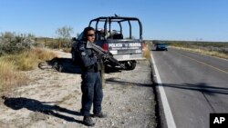 Iván Reyes trabajó de 2003 a 2016 en la Unidad de Investigación Sensible de la policía federal mexicana, y de 2008 a 2016 fue su oficial de mayor rango. En la foto, un agente en ViIlla Unión, México.