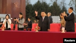 North Korean leader Kim Jong Un and his daughter Kim Ju Ae attend a celebration of the 79th anniversary of the founding of the Workers' Party of Korea in Pyongyang, Oct. 10, 2024. (KCNA via Reuters) 