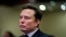 FILE - Tesla CEO and X owner Elon Musk listens as US President-elect Donald Trump speaks during a meeting with House Republicans at the Hyatt Regency hotel in Washington, on November 13, 2024. 