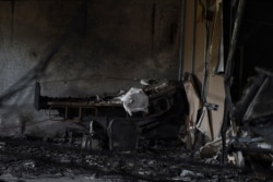 A charred hospital bed is seen at a ward of the Welfare Hospital after a fire broke out overnight, in Bharuch, some 190 kms from Ahmedabad, India, May 1, 2021.