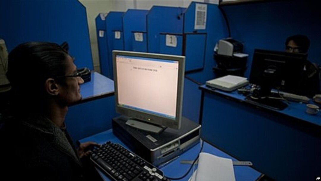 People use the Internet at a cafe in Pakistan where officials want to implement content filters, March 7, 2012.