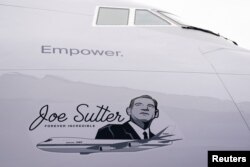 Artwork on the final 747 jet honors Joe Sutter, who was chief engineer for the Boeing 747, during a delivery event at the Boeing plant in Everett, Washington, US Jan. 31, 2023.