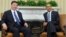 President Barack Obama meets with Chinese Vice President Xi Jinping, Feb., 14, 2012, in the Oval Office of the White House in Washington. 