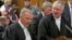 Prosecutor Gerrie Nel (L) and defense lawyer Barry Roux (R) chat at the end of an appeal against South African paralympian Oscar Pistorius' conviction last year at the Supreme Court of Appeal in Bloemfontein, South Africa, Nov. 3, 2015.