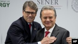 U.S Energy Secretary Rick Perry embraces Mexico's Secretary of Energy Pedro Joaquin Coldwell, after they made a joint statement in Mexico City, July 13, 2017. 