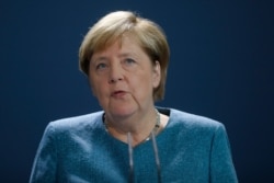 German Chancellor Angela Merkel speaks to media during a statement about latest developments in the case of Russian opposition leader Alexei Navalny at the chancellery in Berlin, Germany, Sept. 2, 2020.