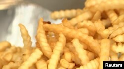 Fries prepared by the Flippy 2 robot are seen at a lab of manufacturer Miso Robotics Inc in Pasadena, California on September 27, 2022 in this screen grab from a REUTERS video. (Sandra Stojanovic/REUTERS TV via REUTERS)