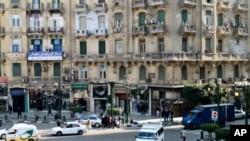 The balcony of the Cairo Inn in central Cairo overlooks busy Talat Harb Square, only a short walk from iconic Tahrir Square, December 14, 2011.