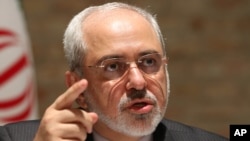 Iranian Foreign Minister Mohammad Javad Zarif speaks to media after closed-door nuclear talks on Iran in Vienna, Austria, July 15, 2014. 