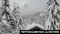 General view after heavy snowfall in Sappada, Italy, Jan. 3, 2021, in this still image obtained from a social media video. (Twitter/Aametsoc)