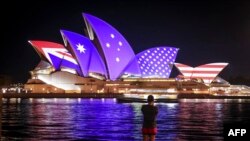 The flags of the U.S. and Australia are projected onto the sails of the Opera House to commemorate the 70th anniversary of the alliance between Australia, New Zealand and the U.S. known as the ANZUS Treaty in Sydney.