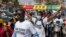 FILE — Supporters of the Aar Sunu Senegal opposition collective demonstrate on a street, in Dakar, on February 17, 2024. 