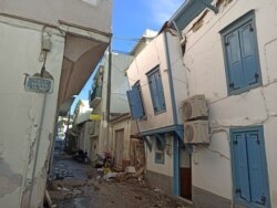 Damaged buildings at the port town of Vathy following an earthquake, on the island of Samos, Greece, Oct. 30, 2020. (Samos24.gr via Reuters)