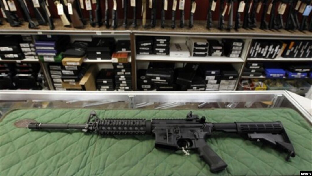 AR-15 style rifle is displayed at the Firing-Line indoor range and gun shop, in Aurora, Colorado, July 2012. Similar weapons have been used in at least four high-profile shootings in the past year.