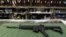FILE - An AR-15 style rifle is displayed at the Firing-Line indoor range and gun shop, in Aurora, Colorado. A school district in the western U.S. state of Colorado is set to arm its security personnel with semi-automatic rifles similar to those used by United States military.
