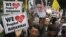 Muslim demonstrators hold banners during a protest in front of the U.S. embassy in Bangkok September 18, 2012. 