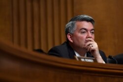 FILE - Sen. Cory Gardner, R-Colo., listens during a hearing to review the FY 2020 State Department budget request, April 10, 2019.