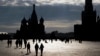 FILE - People walk through Red Square in Moscow.