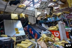 Debris is seen inside a convenience store in Lakewood Park, Florida, after a tornado hit the area and caused severe damage as Hurricane Milton swept through Florida on Oct. 10, 2024.