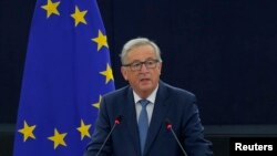 FILE - European Commission President Jean-Claude Juncker addresses the European Parliament during a debate on The State of the European Union in Strasbourg, France, Sept. 14, 2016. 