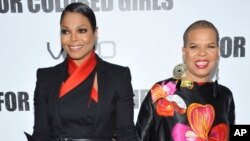 FILE - Actress Janet Jackson, left, and author Ntozake Shange attend a special screening of "For Colored Girls" at the Ziegfeld Theatre in New York. Playwright, poet and author Ntozake Shange, whose most acclaimed theater piece is the 1975 Tony Award-nominated play "For Colored Girls Who Have Considered Suicide/When the Rainbow is Enuf," has died Saturday, according to her daughter, Savannah Shange. She was 70.