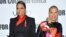 FILE - Actress Janet Jackson, left, and author Ntozake Shange attend a special screening of "For Colored Girls" at the Ziegfeld Theatre in New York. Playwright, poet and author Ntozake Shange, whose most acclaimed theater piece is the 1975 Tony Award-nominated play "For Colored Girls Who Have Considered Suicide/When the Rainbow is Enuf," has died Saturday, according to her daughter, Savannah Shange. She was 70.