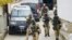 Soldiers of the European Union Rule-of-Law (EULEX) in Kosovo carry out special operations at the house of the former Parliament speaker of Kosovo and former Kosovo Liberation Army (KLA) spokesman Jakup Krasniqi in Pristina, Nov. 4, 2020.