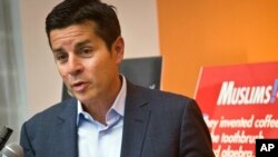 FILE - Muslim comedian Dean Obeidallah speaks at a news conference in New York, June 25, 2015.