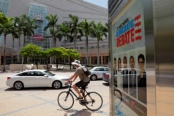 Traffic moves past Miami's Adrienne Arsht Performing Arts Center the day before 20 Democratic U.S. presidential candidates begin a two night debate that will be the first debate of the 2020 U.S. presidential election in Miami.