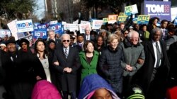 Demokratski rivali Talsi Gabard, Džo Bajden, Ejmi Klobučar, Elizabet Voren i Berni Sanders zajedno su učestvovali u Maršu na dan Martina Lutera Kinga u Južnoj Karolini 20. januara 2020.