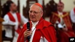 FILE - Patriarch of the Chaldean Catholic Church, Cardinal Louis Sako, addresses the faithful during a service at at Mar Youssif Church in Baghdad, Iraq, April 14, 2019.