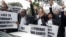 FILE: Lawyers of the Law Society of Zimbabwe bar association take part in a "March for Justice" toward the Constitutional Court in Harare on January 29, 2019, to call for restoration of the rule of law, respect of human rights as well as the country's Constitution. (Photo by Jeke