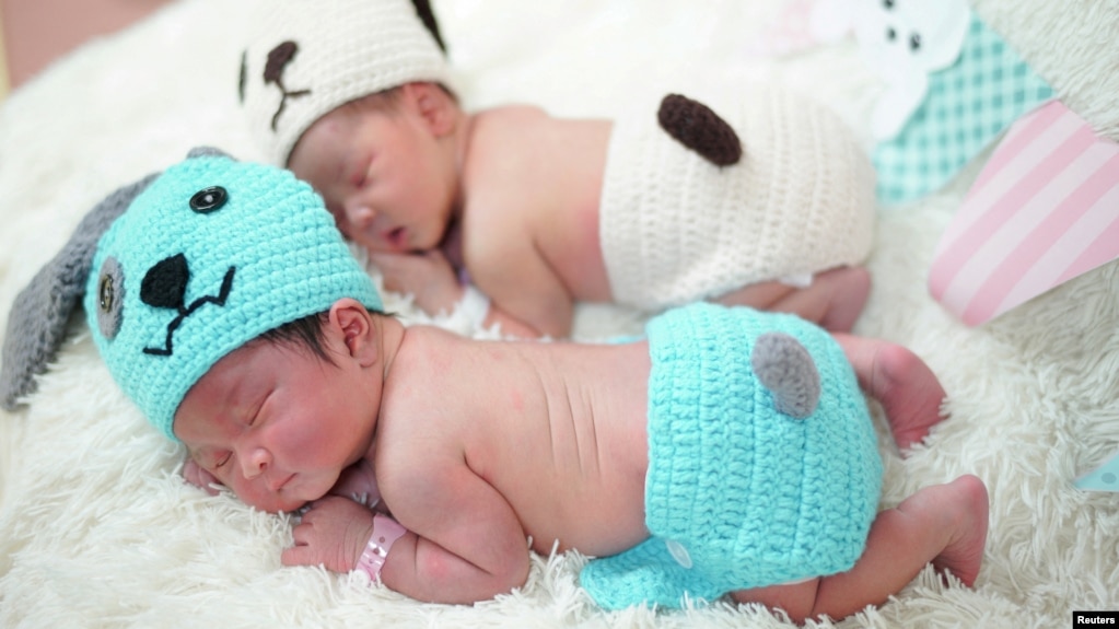 Newborn babies wearing dog styled clothing to celebrate the New Year of the Dog are pictured at the Paolo Chokchai 4 Hospital in Bangkok, Thailand on December 28, 2017. (REUTERS/Athit Perawongmetha/File Photo)