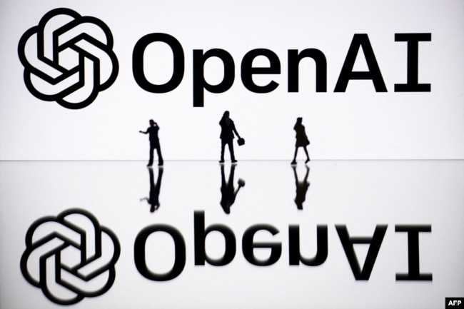 FILE - This illustration photograph taken on October 30, 2023, in Mulhouse, eastern France, shows figurines next to a screen displaying a logo of OpenAI, a US artificial intelligence organization. (Photo by SEBASTIEN BOZON / AFP)