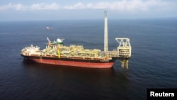 FILE - The oil ship Prof John Evans Atta Mills is seen moored off the coast of the port of Takoradi, Ghana, July 14, 2016. 