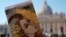 Pope Francis book on "Fake News", is pictured in front of St. Peter's Basilica, in Rome, Jan. 24, 2018.