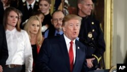 President Donald Trump speaks during an event declaring the opioid crisis in the U.S. a national public health emergency, in the East Room of the White House, Oct. 26, 2017, in Washington.