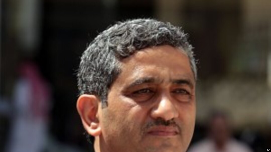 Mansour al-Jamri, former chief editor of the Bahraini opposition newspaper Al Wasat, arrives at the courthouse in Manama, Bahrain, May 18, 2011