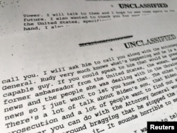 FILE - A section of a White House memorandum describing President Donald Trump's call with Ukrainian President Volodymyr Zelenskiy in this copy of the memorandum released by the White House in Washington, Sept. 25, 2019.