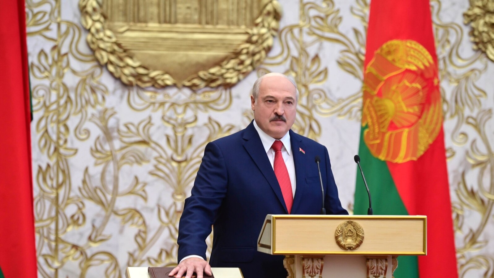 Belarusian President Alexander Lukashenko takes his oath of office during his inauguration ceremony at the Palace of the Independence in Minsk, Belarus, Sept. 23, 2020.